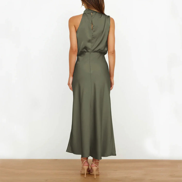 Sleeveless olive green satin midi dress with a loose fit and high neckline, viewed from the back