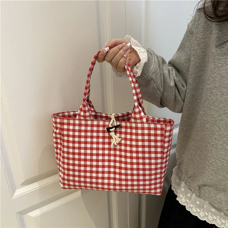 Red and white gingham tote bag with fabric handles and rope closure, casual fit