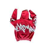 Red streetwear hoodie with white graffiti lettering, relaxed fit, cotton material