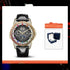 Gold case black dial watch with multicolored crystal bezel, black leather strap, luxury box included.