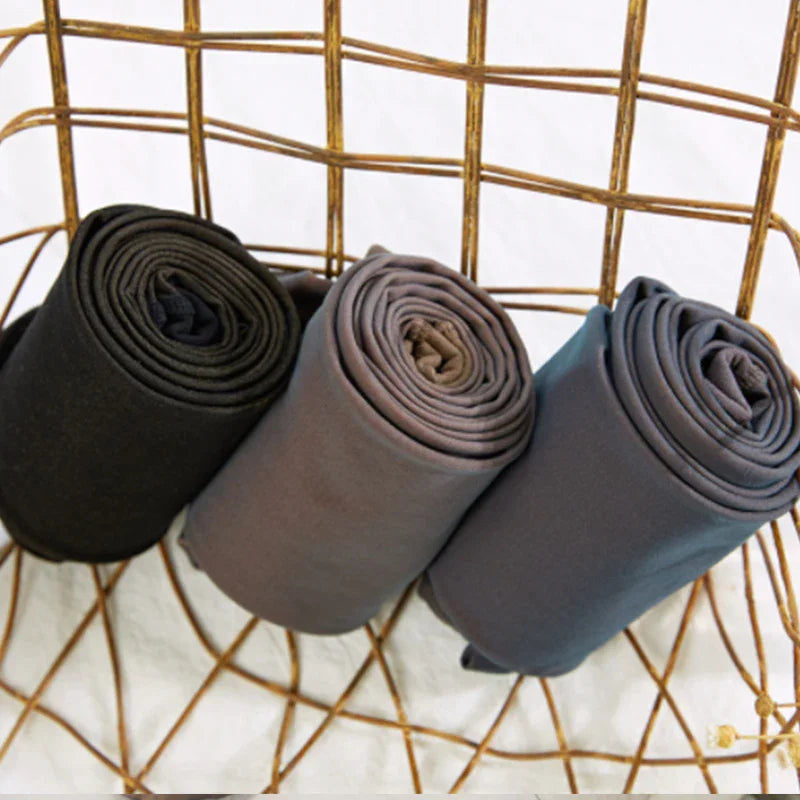 Neutral toned rolled streetwear leggings on wire chair, soft stretch fabric, slim fit