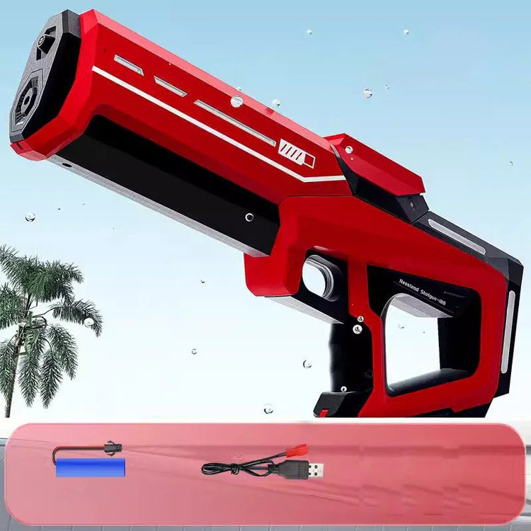 Red and black futuristic water gun with battery and USB charging cable, outdoor setting