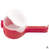 Red plastic container with handle and hinged clear lid, durable lightweight kitchen accessory