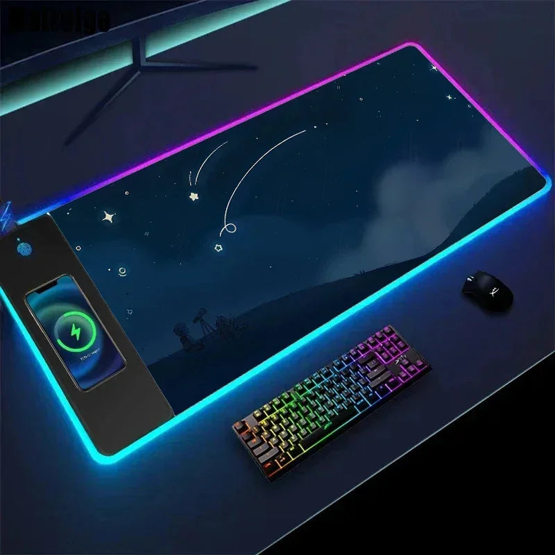 RGB LED gaming desk mat with galaxy design, wireless charging area, mechanical keyboard and mouse
