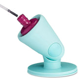 Aqua silicone nail polish bottle holder with magenta polish, adjustable and hands-free design.