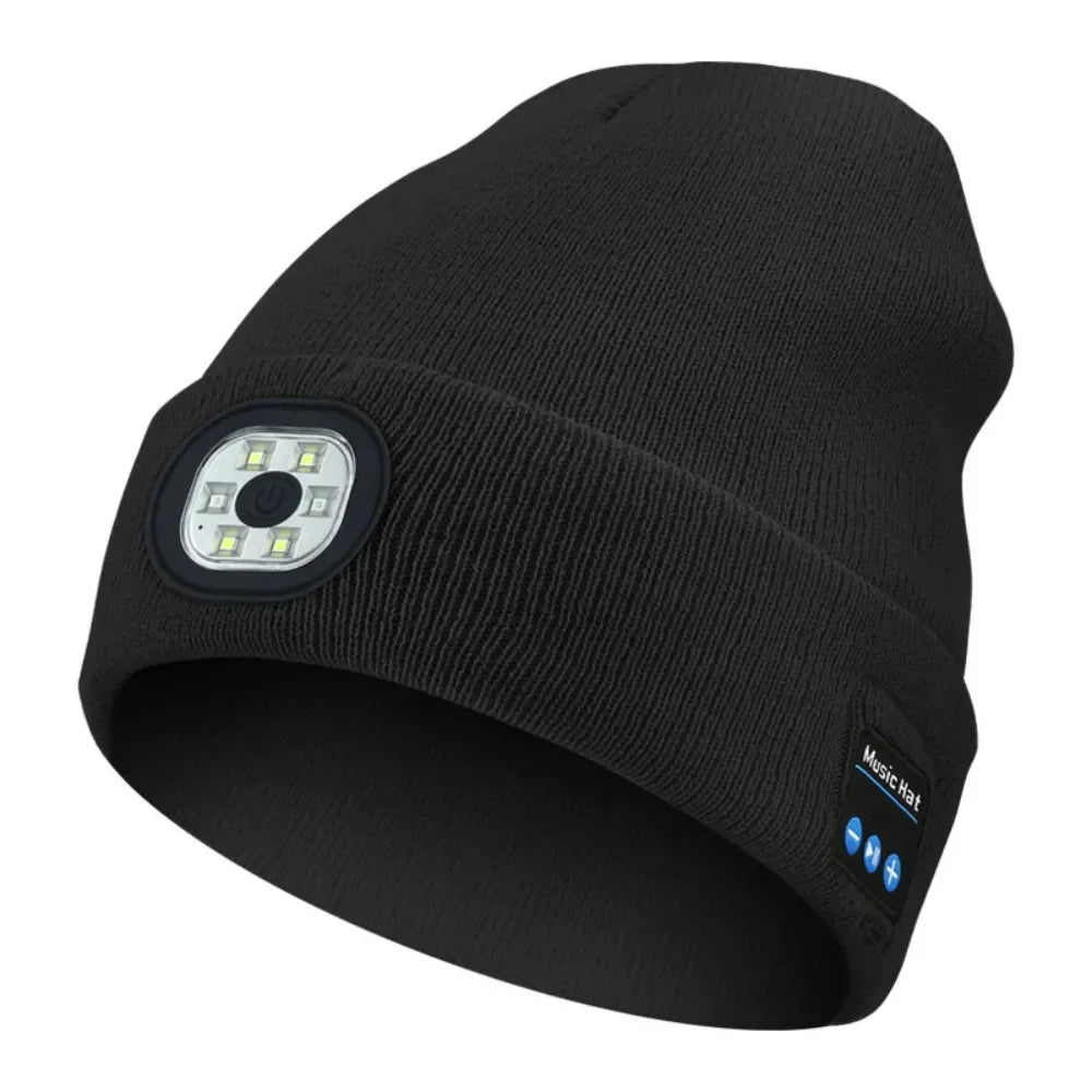 Black knit beanie hat with built-in LED light and control buttons, tech streetwear style.