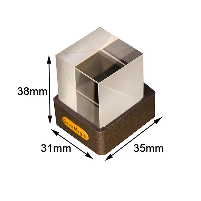 Glass optical prism cube on black base with labeled dimensions 38mm x 31mm x 35mm