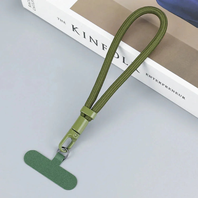 Olive green nylon wrist lanyard with T-shaped attachment, minimalist style.