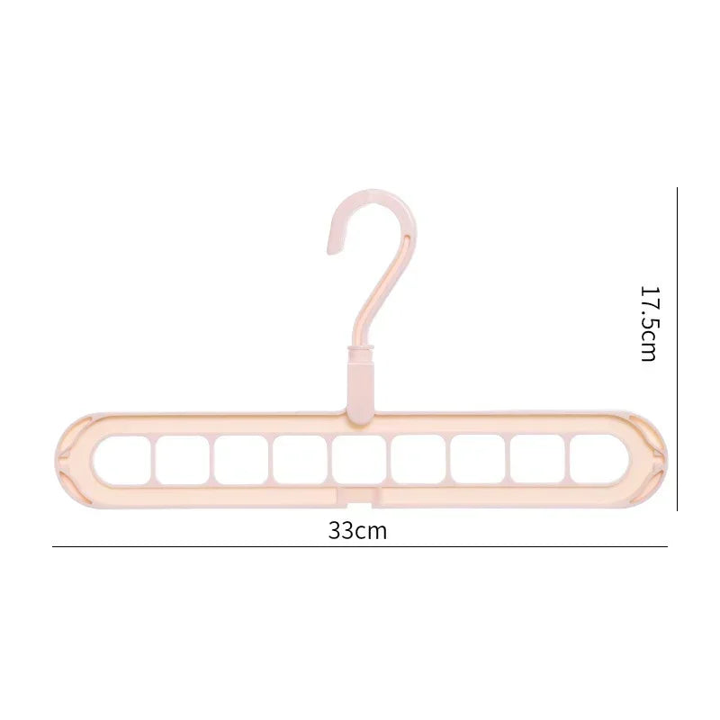 Beige plastic multi-slot clothes hanger with nine openings, 33cm wide, 17.5cm high