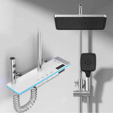 Modern chrome shower system with digital control panel, square rain showerhead, and handheld sprayer.