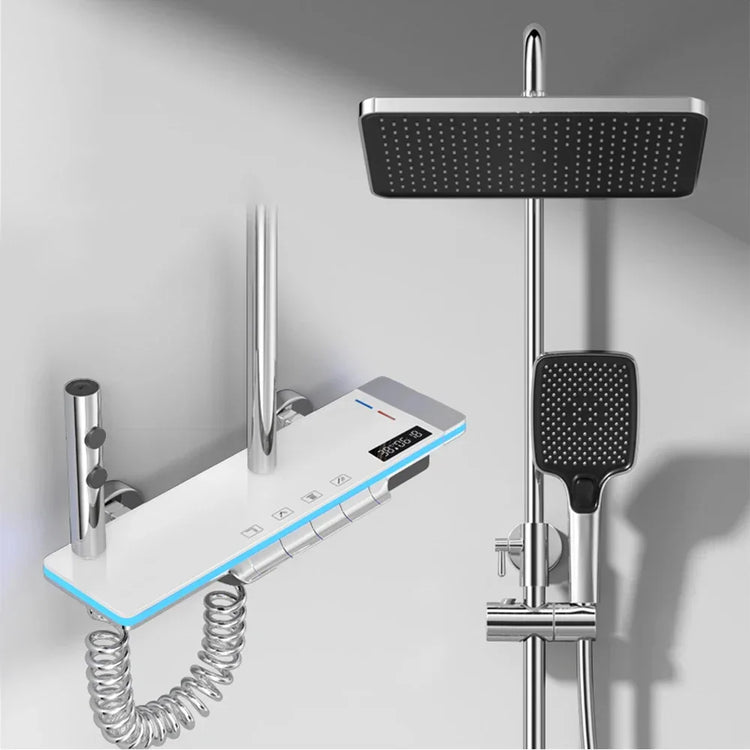 Modern chrome shower system with digital control panel, square rain showerhead, and handheld sprayer.