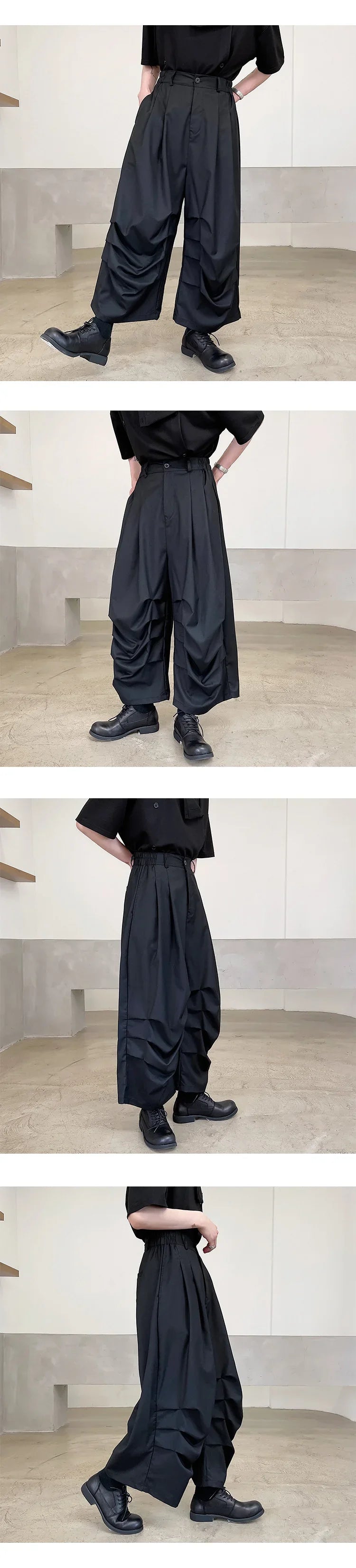 Wide-leg black pleated pants with draped details, relaxed fit, lightweight streetwear style.
