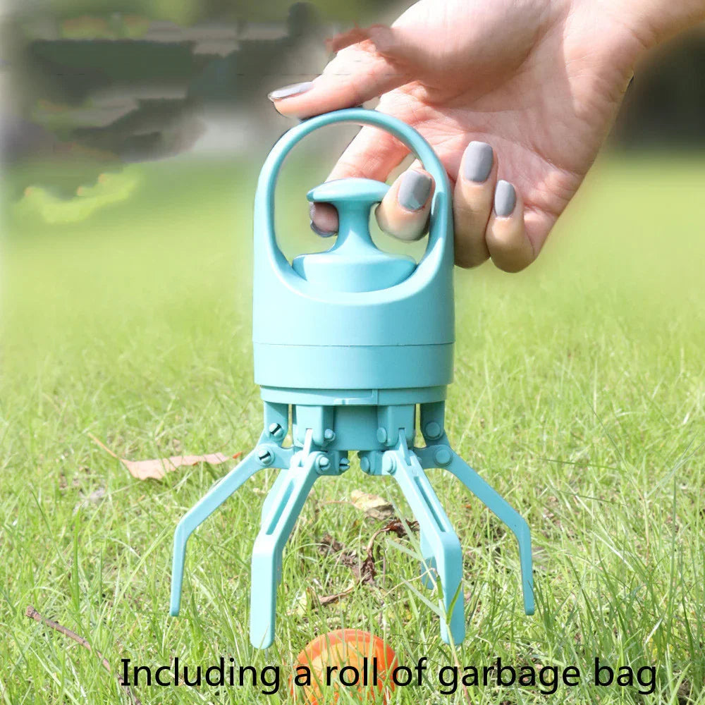 Light blue plastic claw tool for picking up objects, shown in use on green grass