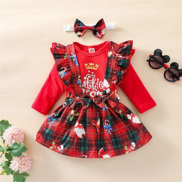 Red plaid toddler dress with ruffled straps, long sleeves, matching headband, and holiday print