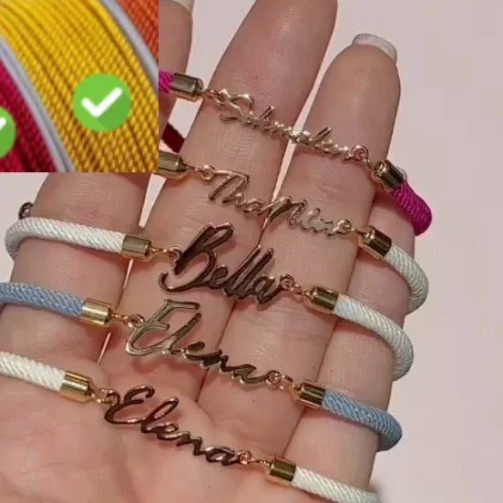Personalized cord bracelets with gold nameplates in pastel colors, casual fit, displayed on hand