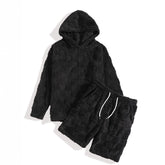 Black textured hoodie and shorts set, plush material, relaxed fit streetwear style