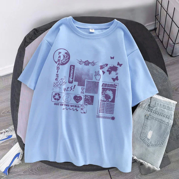Light blue oversized graphic t-shirt with futuristic purple prints, casual streetwear style