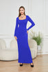Woman wearing a fitted royal blue long-sleeve maxi dress with square neckline