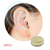 Small round magnet on ear for acupressure, metallic tone, set of 20 pieces shown