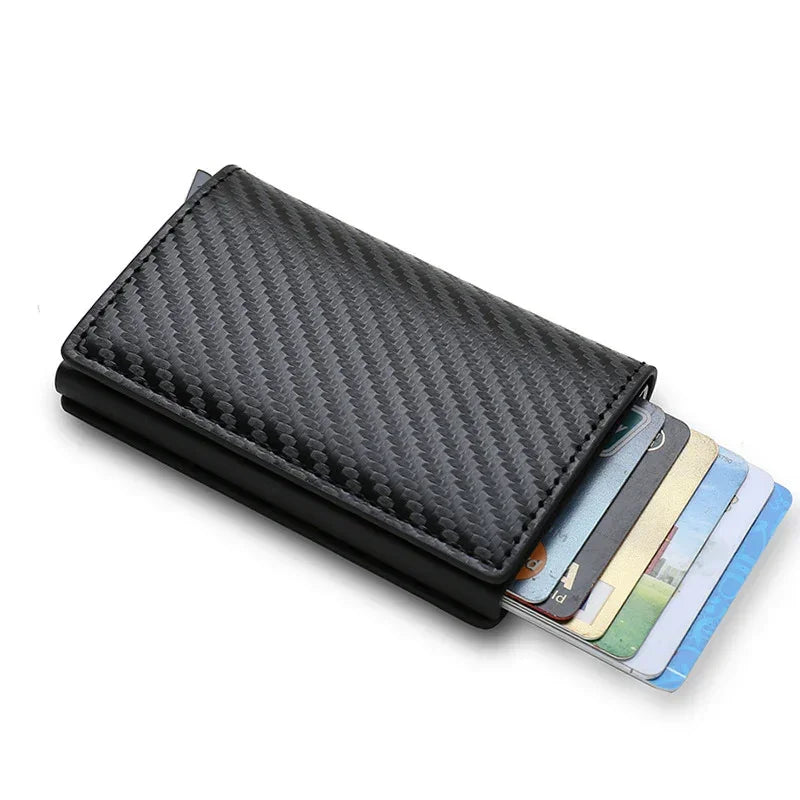 Slim black carbon fiber card holder wallet with multiple credit cards visible