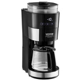 Black and silver automatic coffee maker with digital display and glass carafe