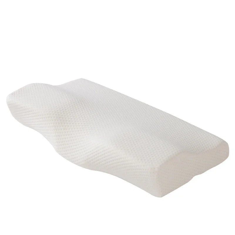 Ergonomic white memory foam pillow with textured cover, contoured for neck support