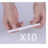 Hands holding a sleek white pen with clear cap, modern minimalist tech accessory, pack of 10