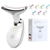 White handheld facial massager with colored LED light settings, shown with product box.