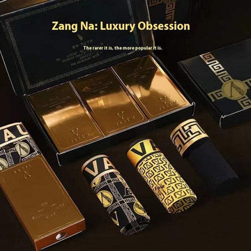 Gold and black streetwear socks with bold geometric patterns in luxury gift box.