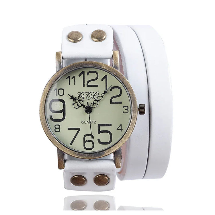 Vintage-style quartz wristwatch with large face and white leather wrap strap