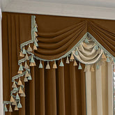 Brown and beige velvet curtains with draped valance and decorative tassels