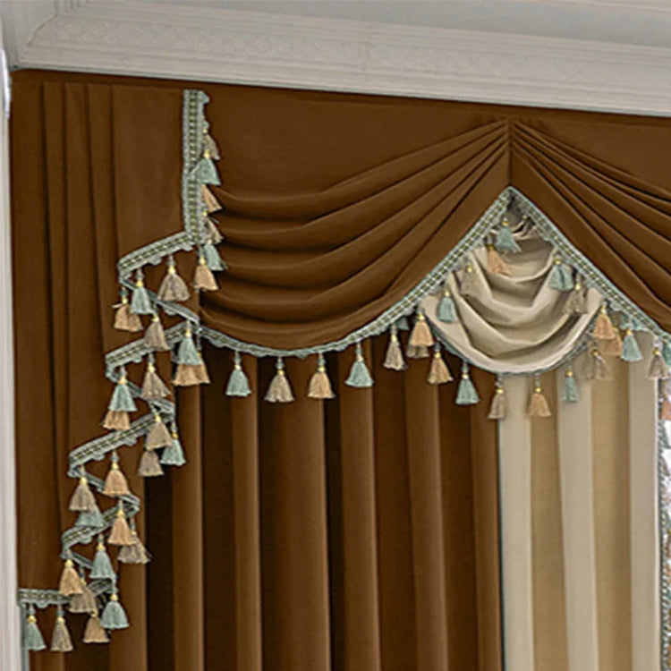 Brown and beige velvet curtains with draped valance and decorative tassels