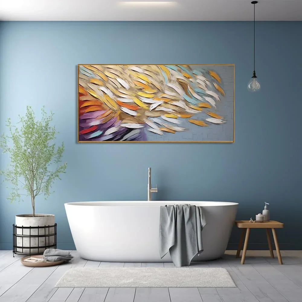 Modern bathroom with white freestanding tub, blue walls, and colorful abstract feather wall art