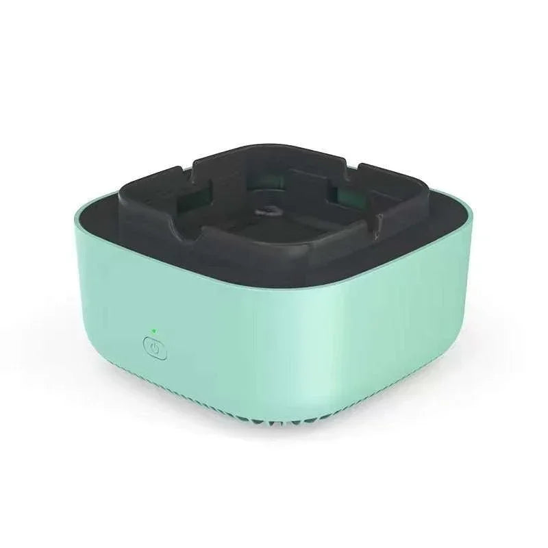 Modern mint green square device with black top, minimalist style tech accessory