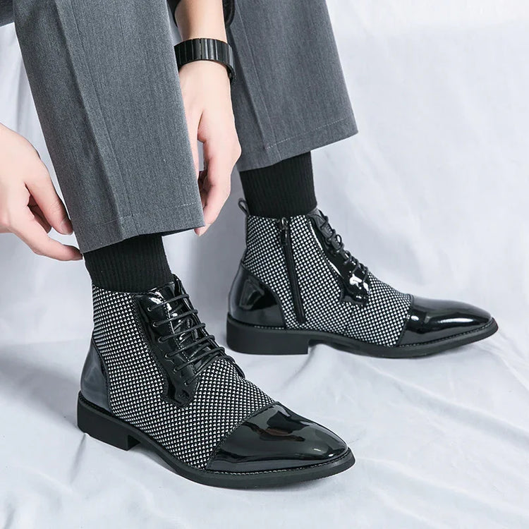 Black and white checkered lace-up ankle boots with glossy leather, paired with gray trousers