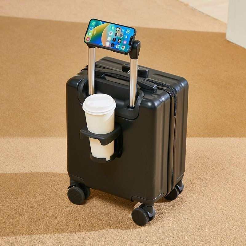 Black hard-shell rolling suitcase with cup holder and phone mount, modern travel design