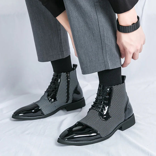 Modern black and white houndstooth ankle boots with glossy patent leather and lace-up design.