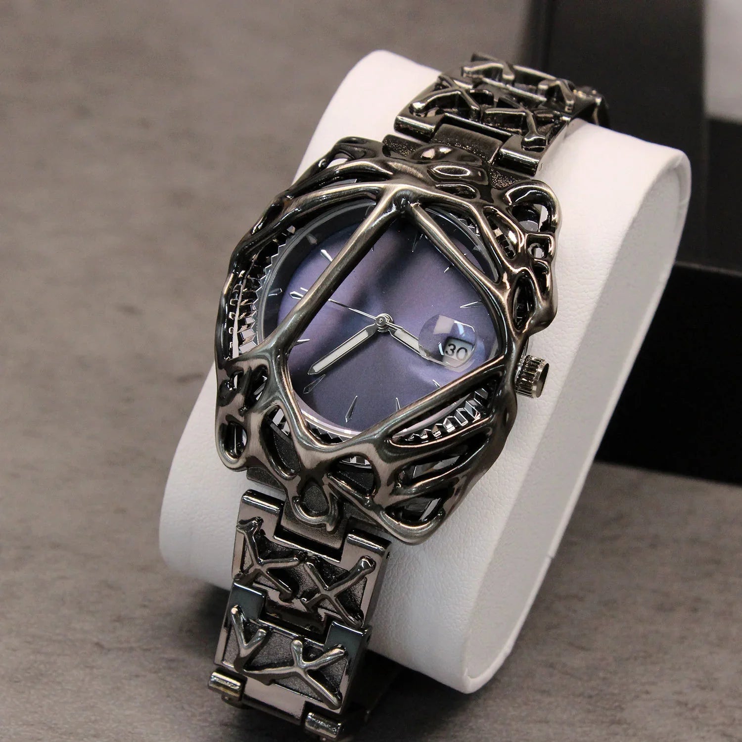 Futuristic streetwear watch with metallic skeleton frame, purple dial, and intricate chain strap