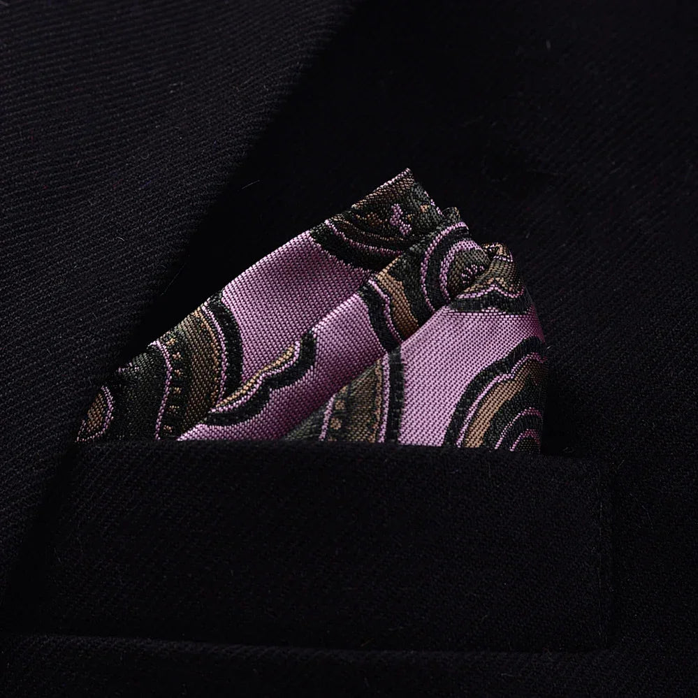 Purple paisley silk pocket square in black suit jacket pocket, elegant streetwear accessory