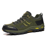 Olive green outdoor sneaker with black rubber sole, yellow accents, and mesh panels.
