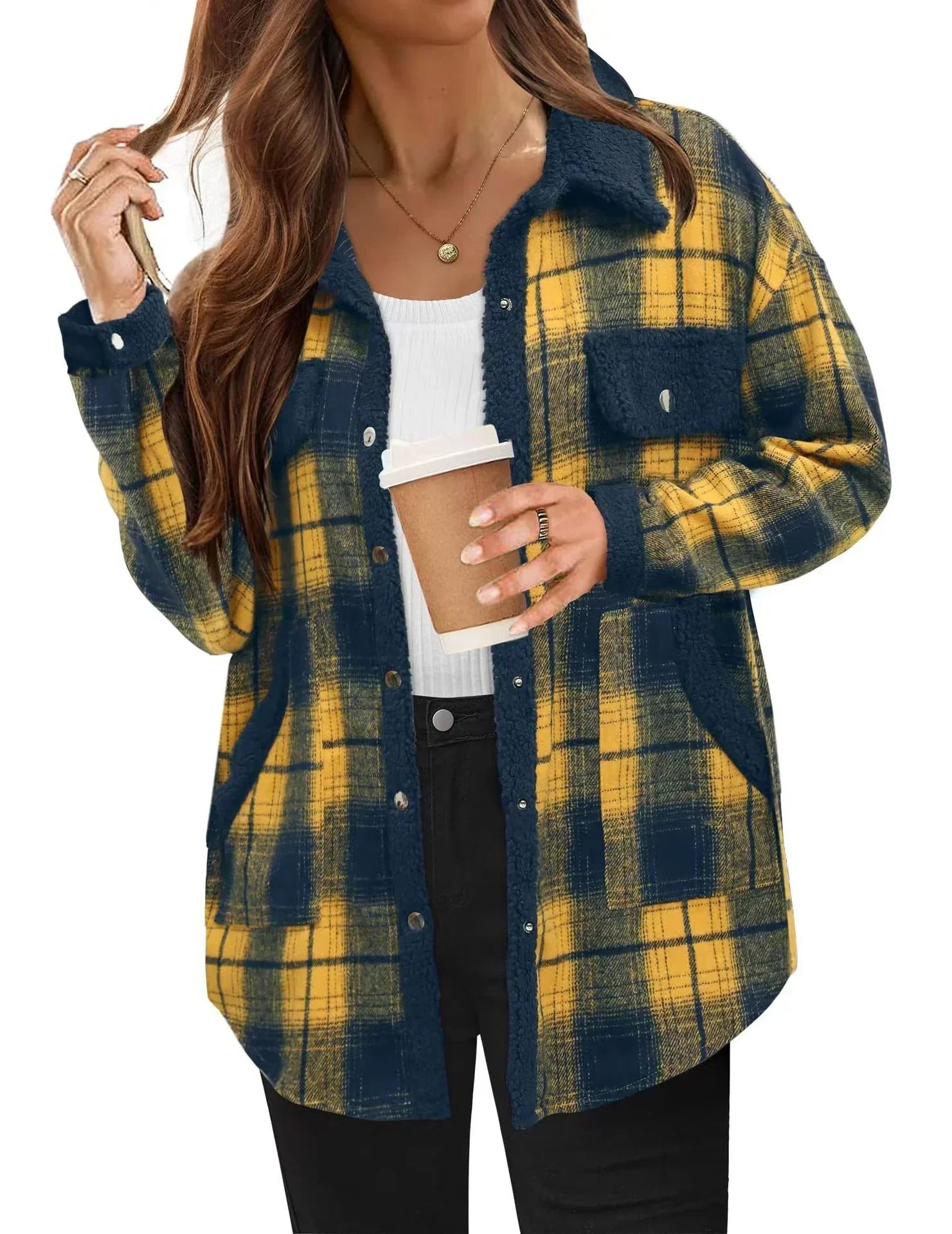 Woman wearing a yellow and navy plaid sherpa fleece jacket with relaxed fit