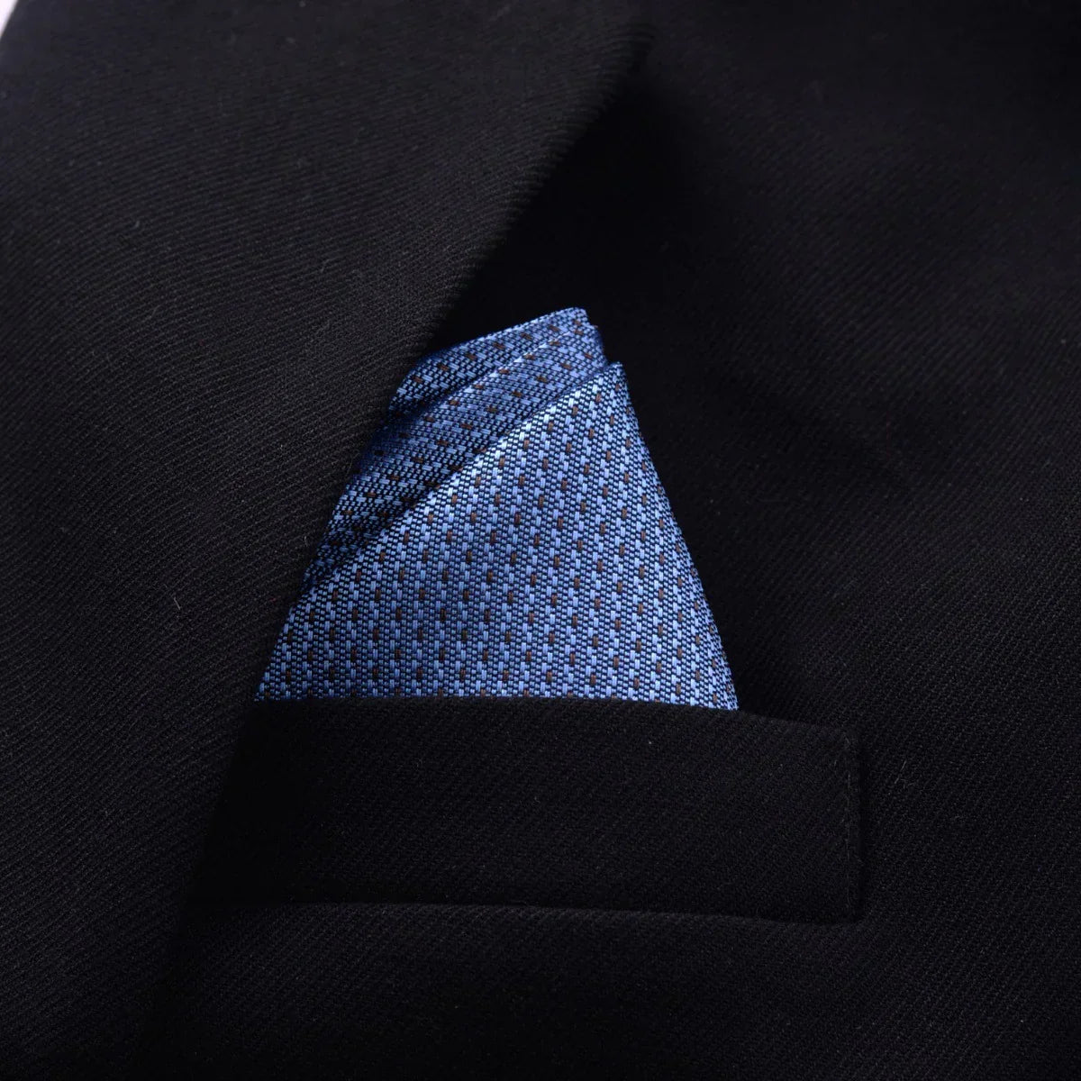 Black blazer with a textured blue pocket square, classic fit, premium woven material.