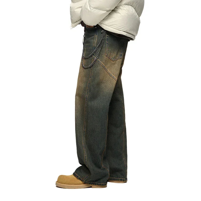 Loose fit faded denim jeans with metal chain detail, casual streetwear style