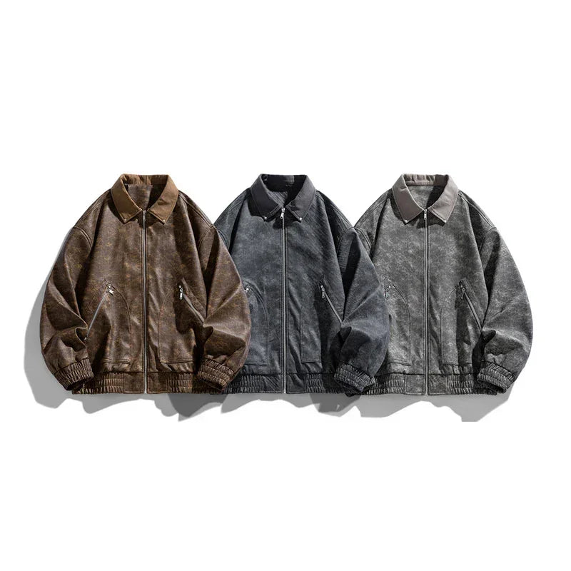 Three oversized bomber jackets in brown, charcoal, and grey faux suede with zip pockets.