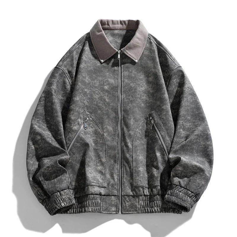 Oversized gray washed bomber jacket with a zip front, side zip pockets, and elastic cuffs