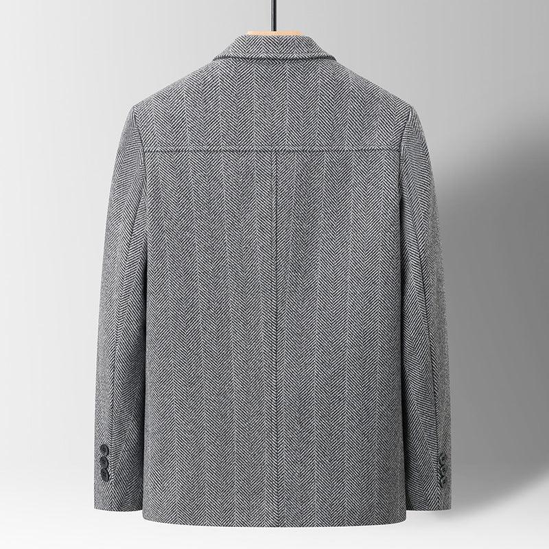 Back view of gray herringbone blazer with button cuffs, tailored fit, and classic collar