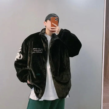 Oversized black faux fur jacket with patch details, casual loose fit streetwear style