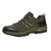 Olive green hiking sneaker with yellow accents, mesh panels, rugged sole, and lace-up design.