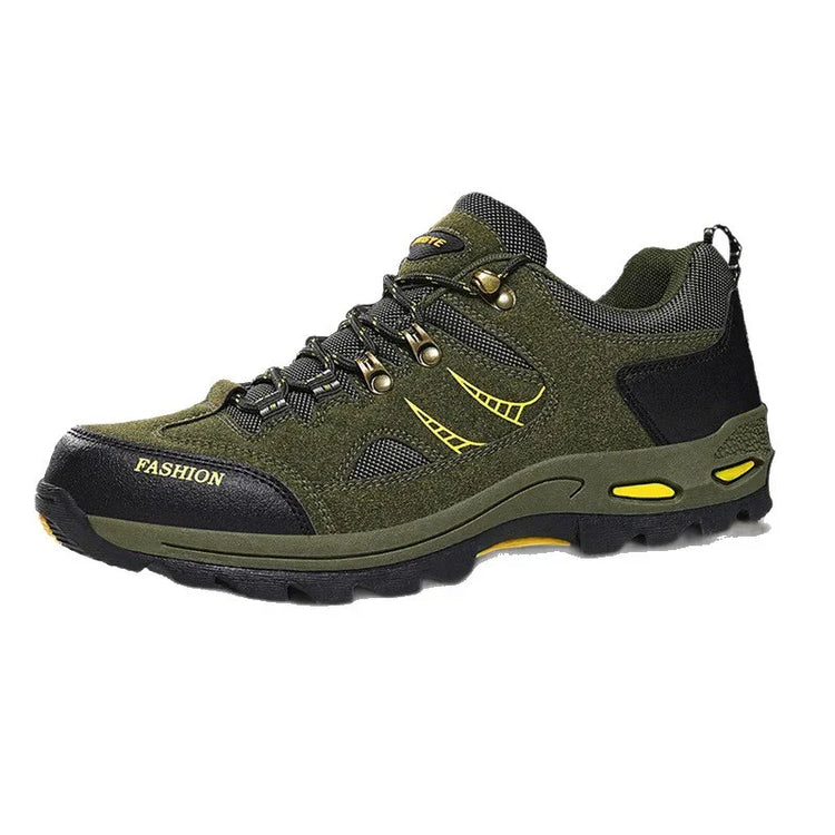 Olive green hiking sneaker with yellow accents, mesh panels, rugged sole, and lace-up design.