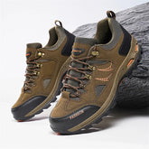 Brown suede and mesh hiking sneakers with rugged soles and lace-up closure, outdoor style
